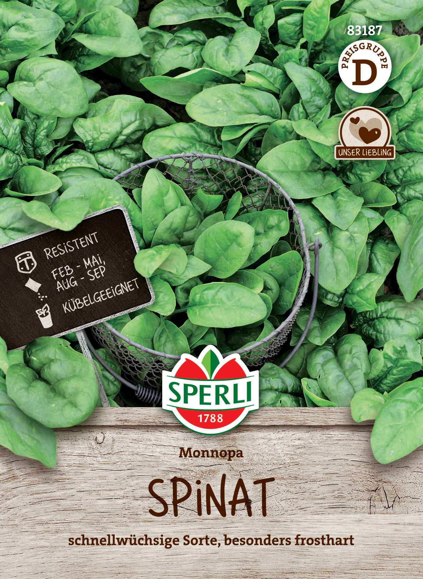 Grüner Spinat auf Erde, auf der Verpackung Steingutplatte mit Angaben, Logo, Korb mit Spinat, Beschreibung und Etiketten.