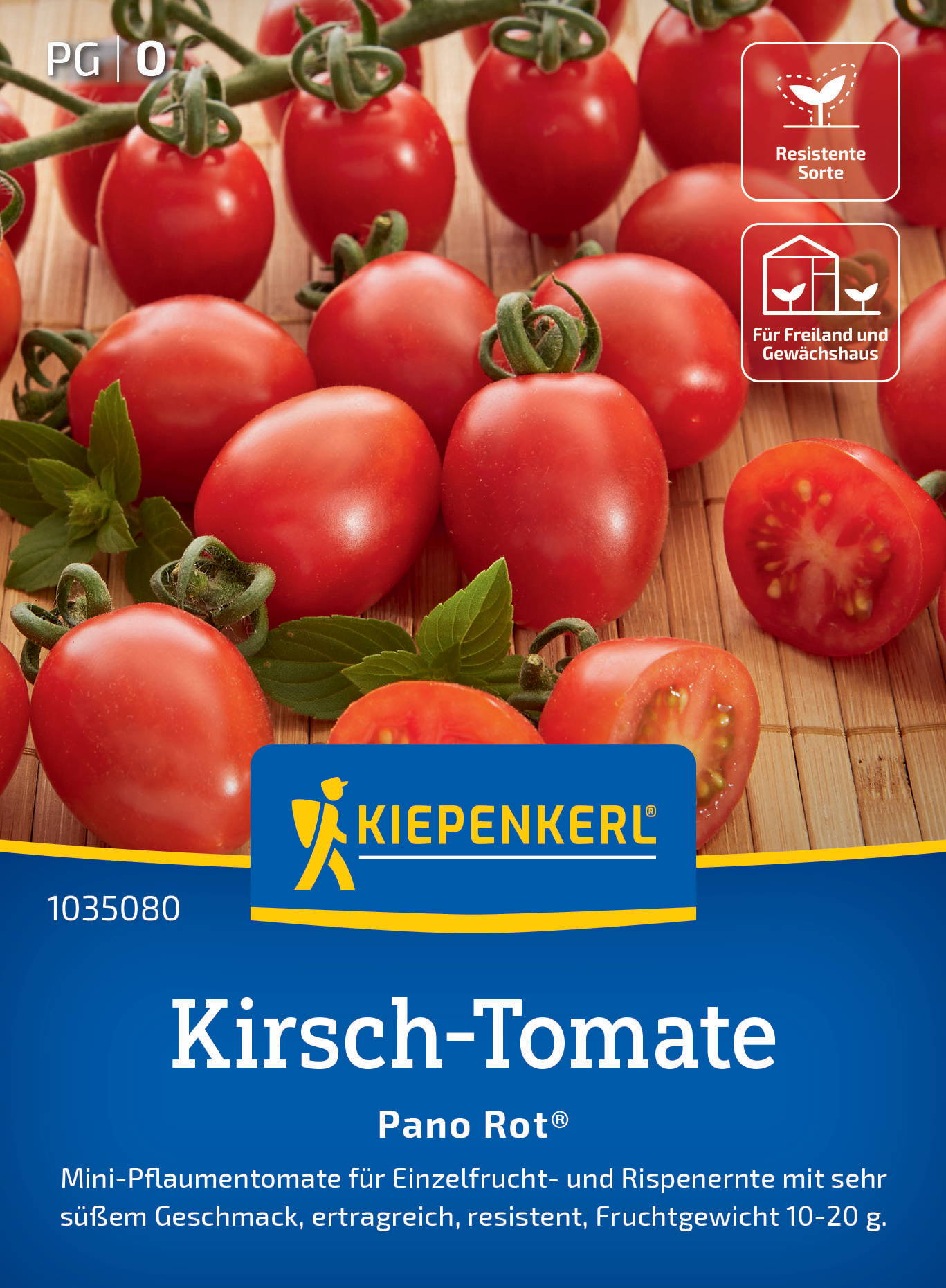 Rote Cherry-Tomaten auf einer Bambusmatte, einige halbiert, mit grünen Blättern.