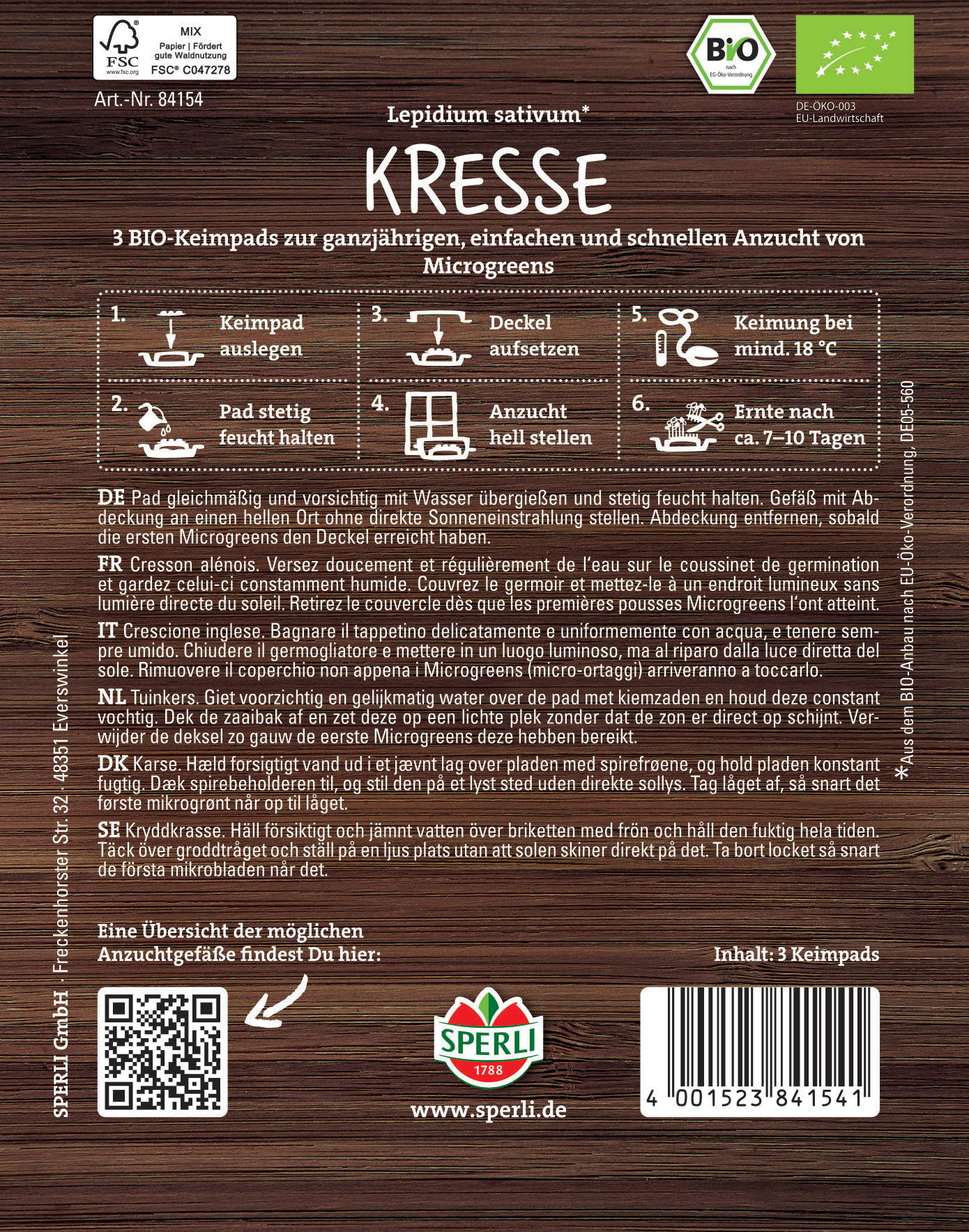 Paket mit Anleitungen, QR-Code, Sperli Logo, Barcode, Text, Holzoptik-Hintergrund.